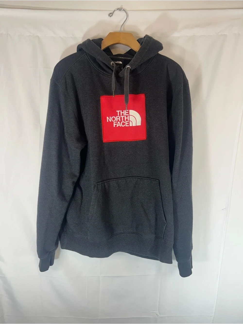 The North Face Black Pullover Hoodie with Red Logo Patch
